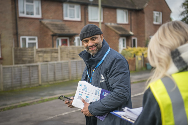 Accent Colleague Wearing Beanie Hat Outside