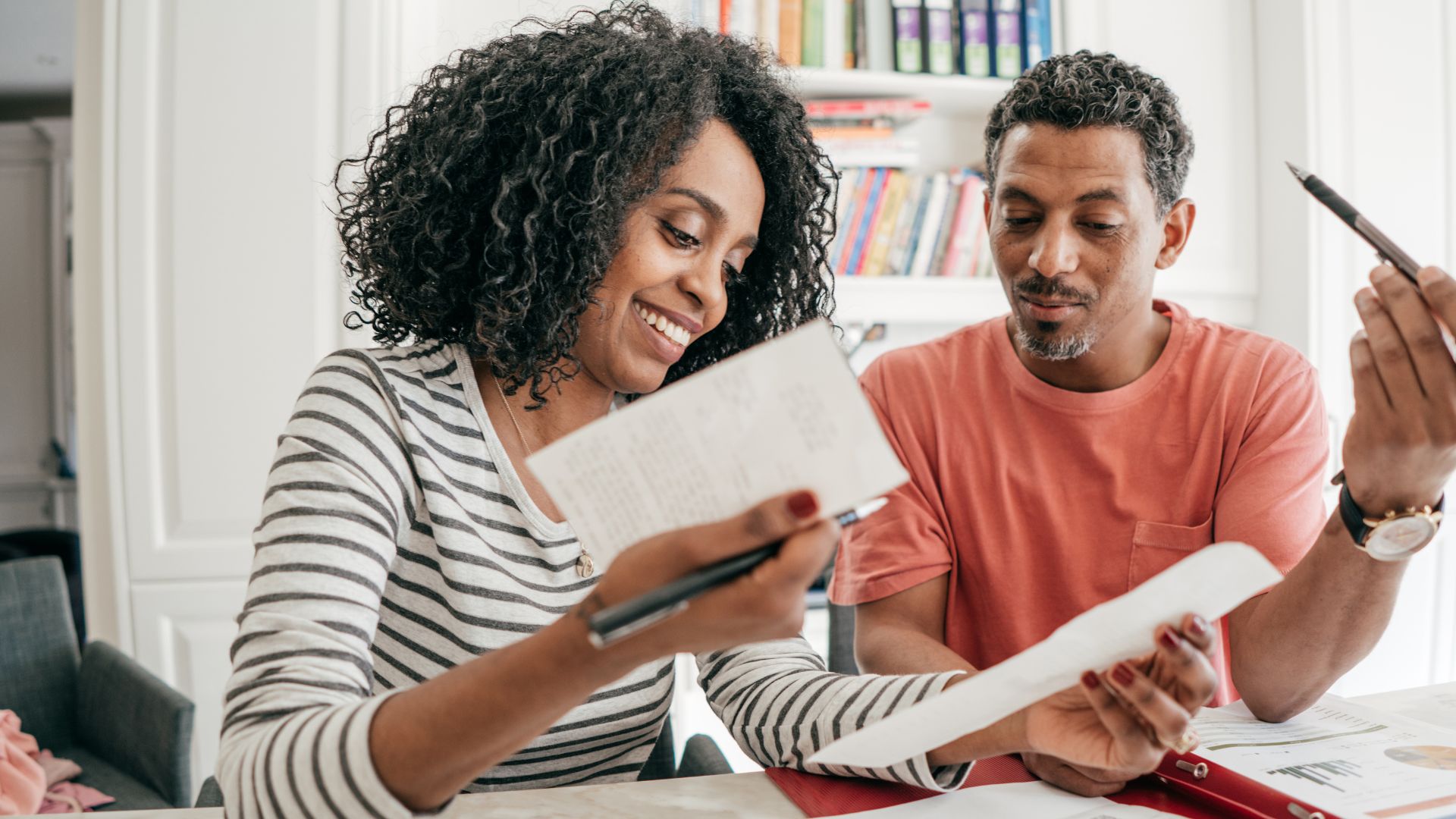 Couple Checking Bills