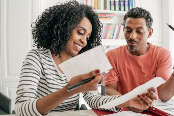 Couple Checking Bills