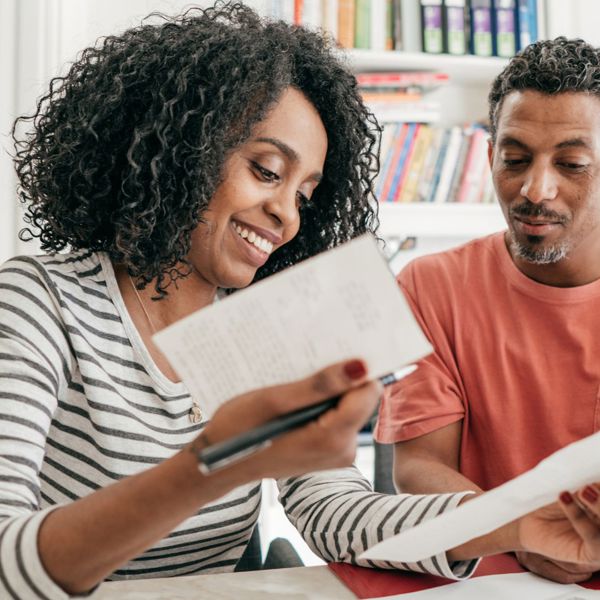 Couple Checking Bills