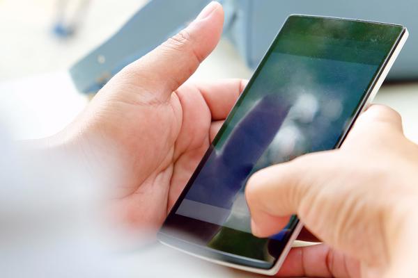 A close-up of someone holding a smartphone