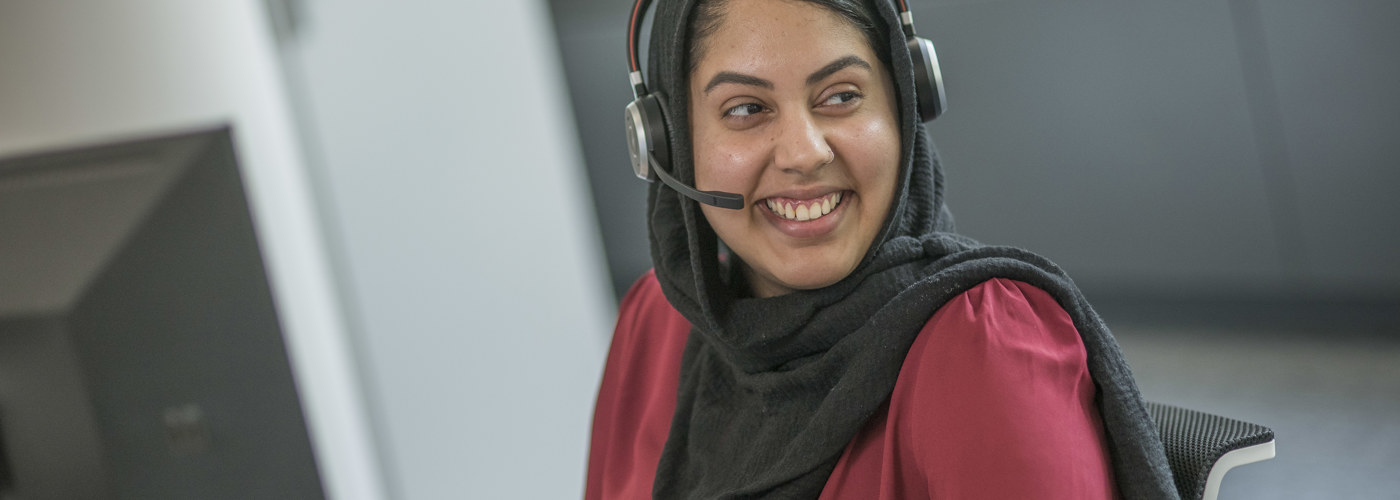 Smiling Lady In Accent Call Centre