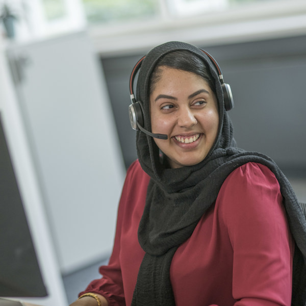 Smiling Lady In Accent Call Centre