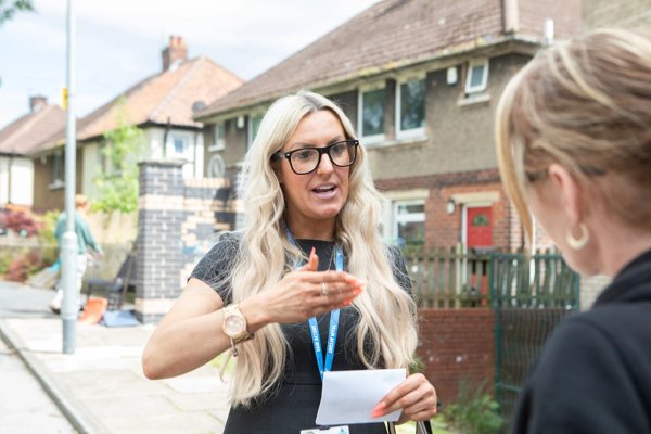 Housing Partner Rachel Talking On Scheme